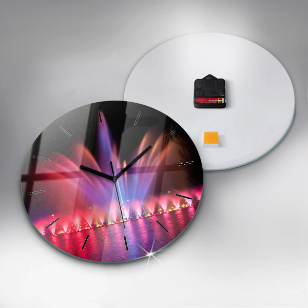 Orologio rotondo Fontana di Wroclaw di notte