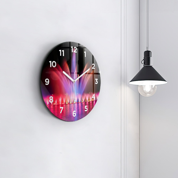 Orologio rotondo Fontana di Wroclaw di notte