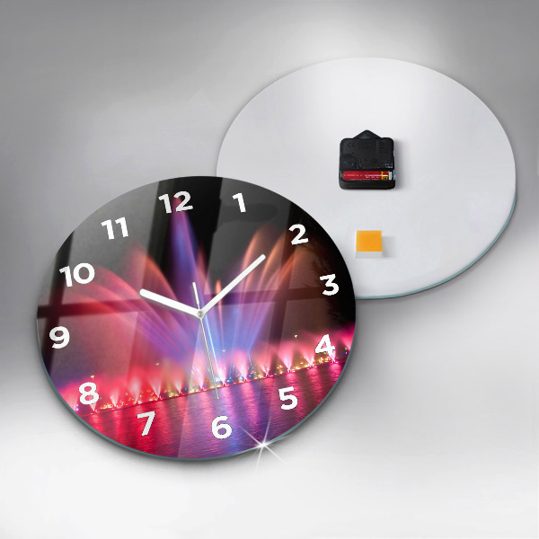 Orologio rotondo Fontana di Wroclaw di notte