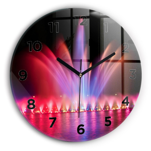 Orologio rotondo Fontana di Wroclaw di notte