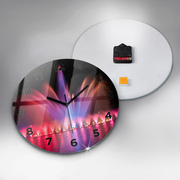 Orologio rotondo Fontana di Wroclaw di notte