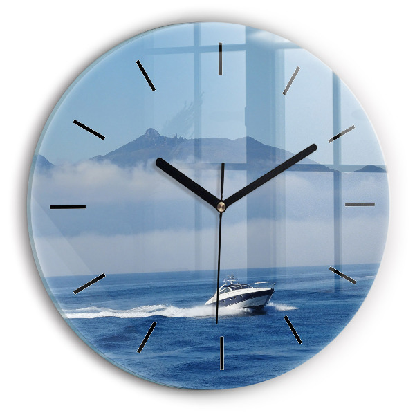 Orologio rotondo in vetro Una barca che galleggia sull'oceano