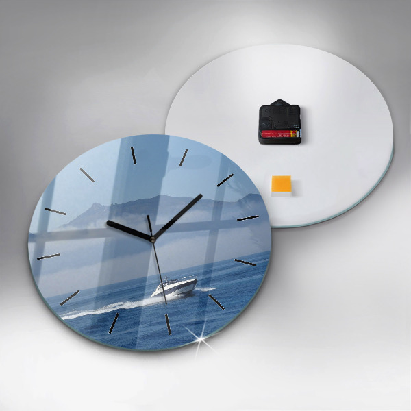 Orologio rotondo in vetro Una barca che galleggia sull'oceano