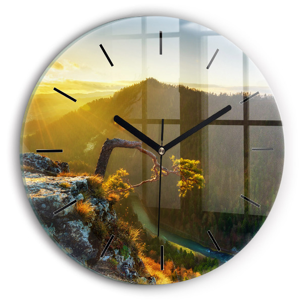 Orologio rotondo Tramonto sulle montagne