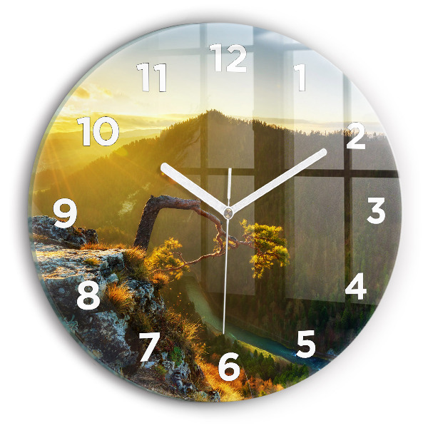Orologio rotondo Tramonto sulle montagne