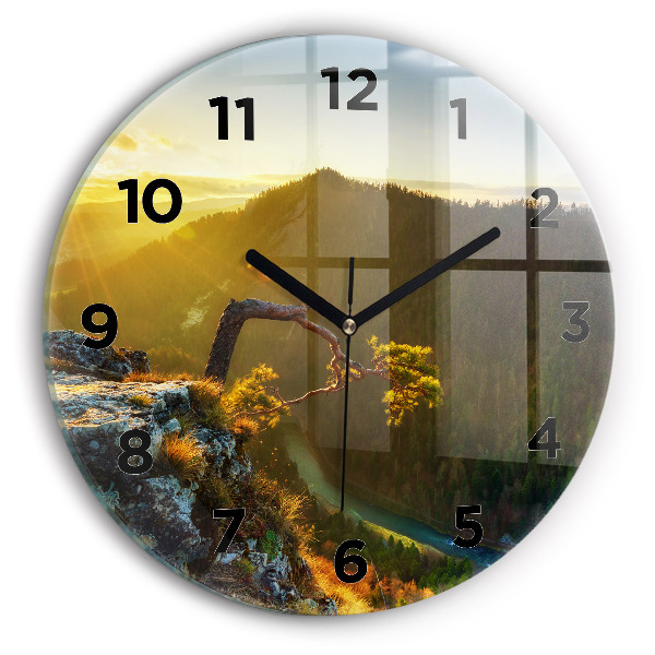 Orologio rotondo Tramonto sulle montagne