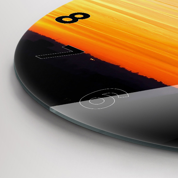 Orologio rotondo in vetro Edificio e tramonto